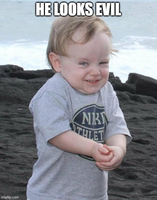 funny-evil-baby | HE LOOKS EVIL | image tagged in funny-evil-baby | made w/ Imgflip meme maker