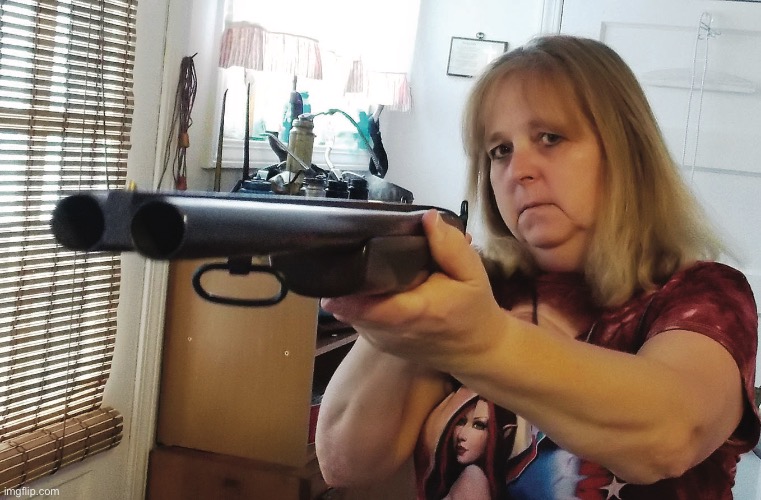 Woman with shot gun | image tagged in woman with shot gun | made w/ Imgflip meme maker