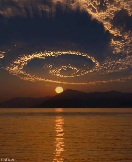 Spiral Cloud Sunset | image tagged in beautiful sunset,awesome,pic | made w/ Imgflip meme maker