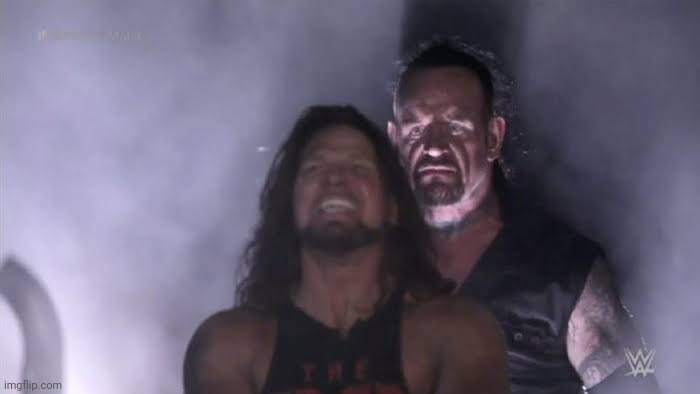 Undertaker behind Aj Styles | image tagged in undertaker behind aj styles | made w/ Imgflip meme maker