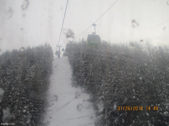The Tram going up Silver Mountain. It is so high in some places and the wind shakes the cars. | image tagged in photography | made w/ Imgflip meme maker