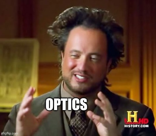 Ancient Aliens Meme | OPTICS | image tagged in memes,ancient aliens | made w/ Imgflip meme maker