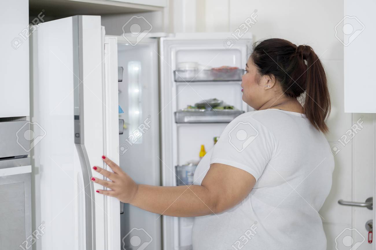 Woman looking in fridge Blank Meme Template