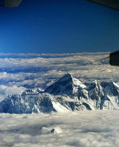 The Mighty Mount Everest | image tagged in mount everest,awesome,mountain,airplane,pictures | made w/ Imgflip meme maker