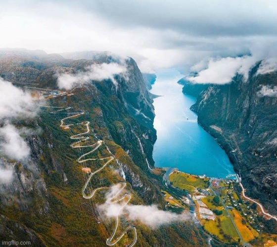 Looking down- Lysefjord, Norway.  Photo credit: Michael Block Photography | image tagged in mountain,river,road,norway,awesome,photography | made w/ Imgflip meme maker