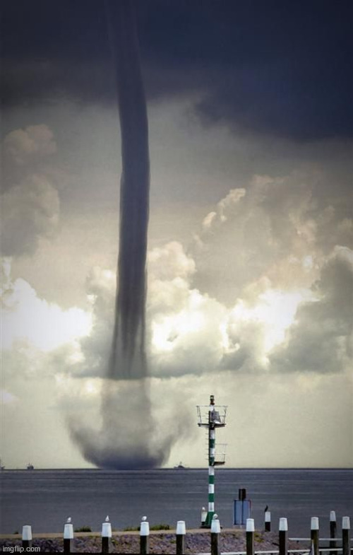 The power, fear and beauty of nature. | image tagged in awesome | made w/ Imgflip meme maker