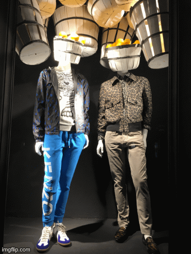 Don Lemon and his partner, Ice-T, butt (lemon) heads. | image tagged in fashion,kenzo,window design,bergdorf goodman,don lemon,brian einersen | made w/ Imgflip images-to-gif maker
