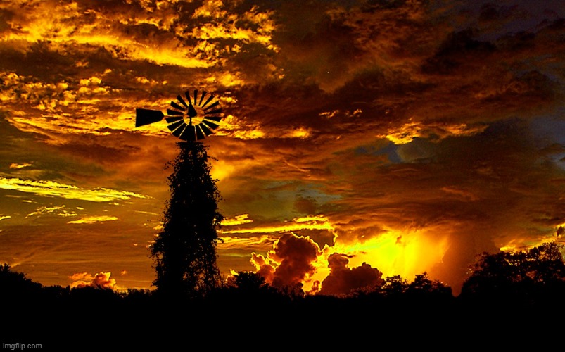 morning storm | image tagged in windmill,storm | made w/ Imgflip meme maker
