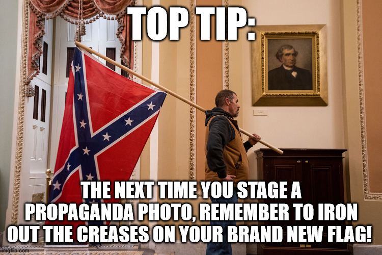 nice try | TOP TIP:; THE NEXT TIME YOU STAGE A PROPAGANDA PHOTO, REMEMBER TO IRON OUT THE CREASES ON YOUR BRAND NEW FLAG! | image tagged in rebel propaganda photo | made w/ Imgflip meme maker