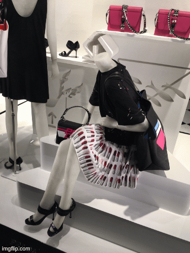 Lipstick Lesbian Loses Her Head! | image tagged in gifs,fashion,window design,prada,lipstick lesbian,brian einersen | made w/ Imgflip images-to-gif maker