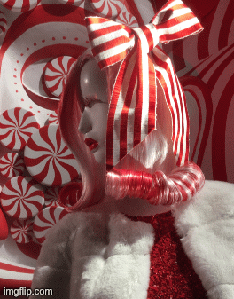 Peppermint is usually nice and sweet until you belittle her holiday bow. Holidays bring out the worst in mannequins. | image tagged in gifs,fashion,alice and olivia,window design,bergdorf goodman,christmas | made w/ Imgflip images-to-gif maker