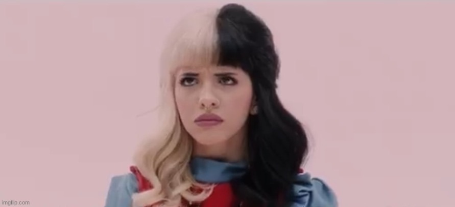 Pouty Melanie Martinez  | image tagged in pouty melanie martinez | made w/ Imgflip meme maker