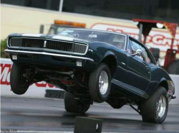 Car wheelie real cars lift their front wheels , not drive them | image tagged in car wheelie real cars lift their front wheels not drive them | made w/ Imgflip meme maker
