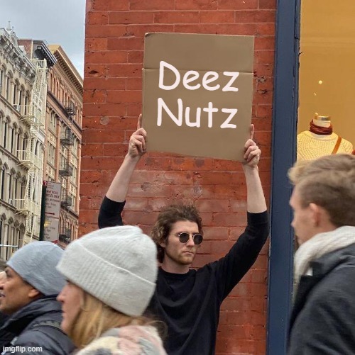 Deez Nutz | image tagged in memes,guy holding cardboard sign | made w/ Imgflip meme maker