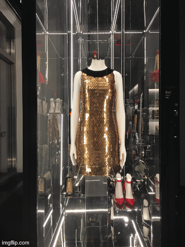 Revolving Display Case at Tom Ford’s Diner | image tagged in gifs,fashion,window design,tom ford,toms diner | made w/ Imgflip images-to-gif maker
