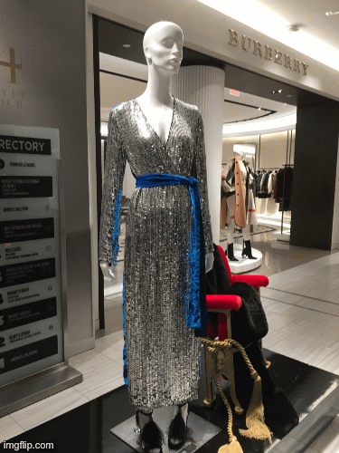 Queen Dido scans her palace for Aeneas, who just left her for his destiny to find Rome. | image tagged in gifs,fashion,attico,saks fifth avenue,dido,brian einersen | made w/ Imgflip images-to-gif maker