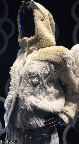 Odysseus dresses as a black sheep to escape family feuds, family reunions, and family game night on Zoom. | image tagged in fashion,chanel,window design,saks fifth avenue,odysseus,brian einersen | made w/ Imgflip images-to-gif maker