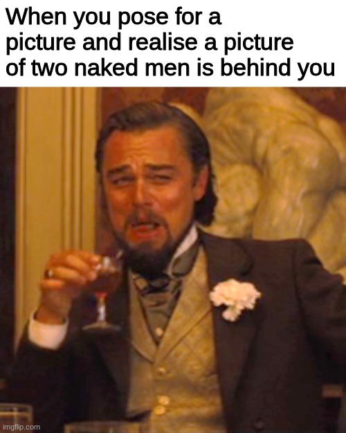 spread the message | When you pose for a picture and realise a picture of two naked men is behind you | image tagged in memes,laughing leo | made w/ Imgflip meme maker