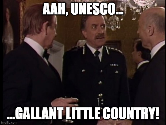 UNESCO | AAH, UNESCO... ...GALLANT LITTLE COUNTRY! | image tagged in yes minister,nicholas courtney,unesco,diplomacy | made w/ Imgflip meme maker
