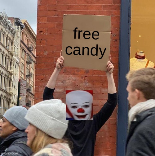 free candy | image tagged in memes,guy holding cardboard sign | made w/ Imgflip meme maker