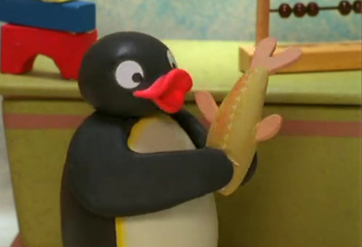 Pingu with a fish Blank Meme Template