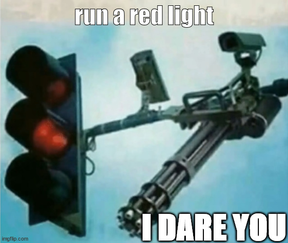 dont do it | run a red light; I DARE YOU | image tagged in guns | made w/ Imgflip meme maker