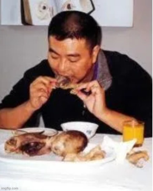 man eating baby | image tagged in man eating baby | made w/ Imgflip meme maker
