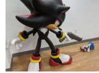 Shadow pointing gun at Sonic Blank Meme Template