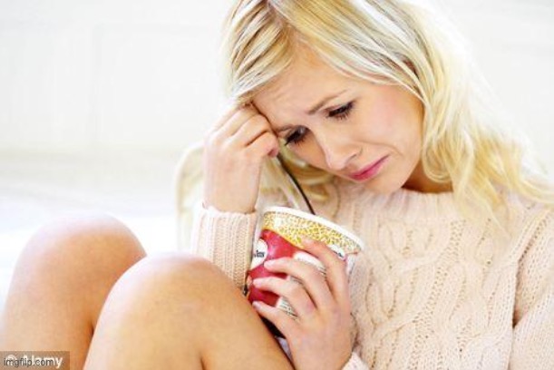 crying woman eating ice cream | image tagged in crying woman eating ice cream | made w/ Imgflip meme maker
