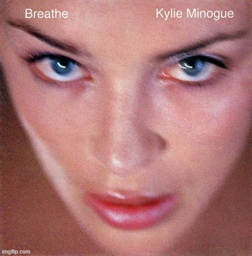[uncomfortably close indie pop close-ups] | image tagged in kylie breathe | made w/ Imgflip meme maker