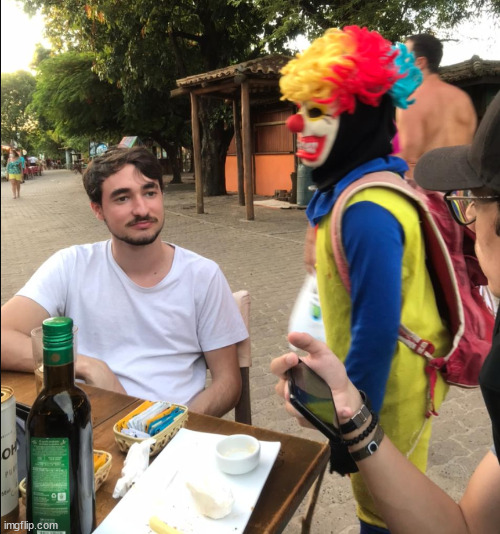 mog and the clown | image tagged in mog,clown,table | made w/ Imgflip meme maker