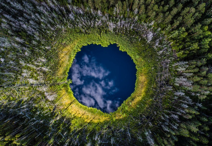 "Sky Hole" Estonia. Photo credit: Sven Začek | image tagged in awesome,pics,photography | made w/ Imgflip meme maker