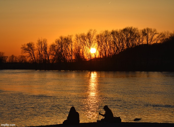 fishing on the rock river at sunset | image tagged in rock river,sunset | made w/ Imgflip meme maker