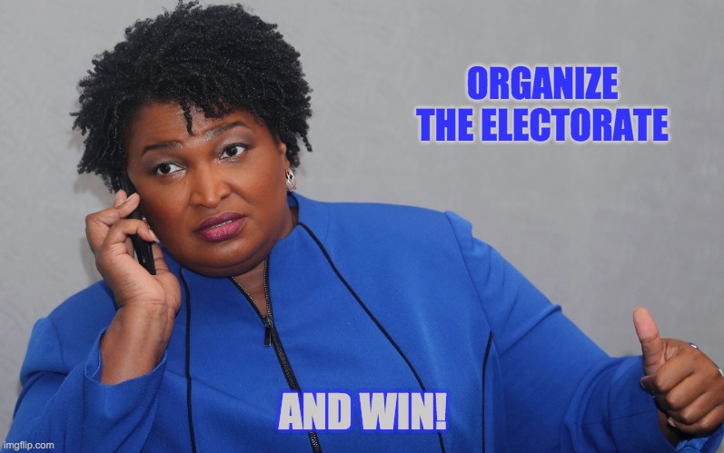 stacey abrams on phone | ORGANIZE
THE ELECTORATE AND WIN! | image tagged in stacey abrams on phone | made w/ Imgflip meme maker