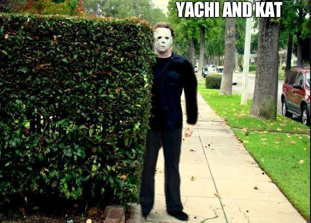 I'm sus of you two | YACHI AND KAT | image tagged in michael myers bush stalking,suspicious | made w/ Imgflip meme maker