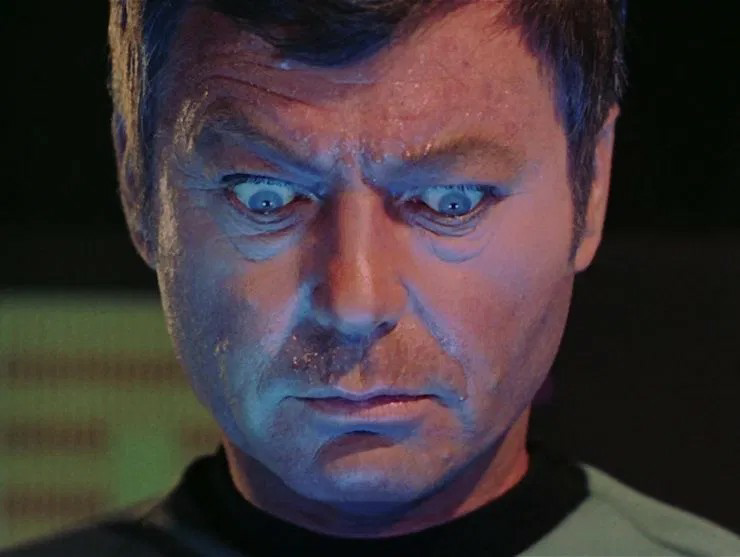Star Trek McCoy wide eyes looking down Blank Meme Template