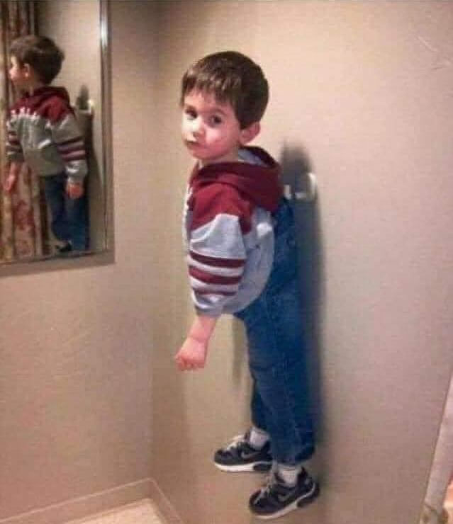 Kid hanging on wall Blank Meme Template