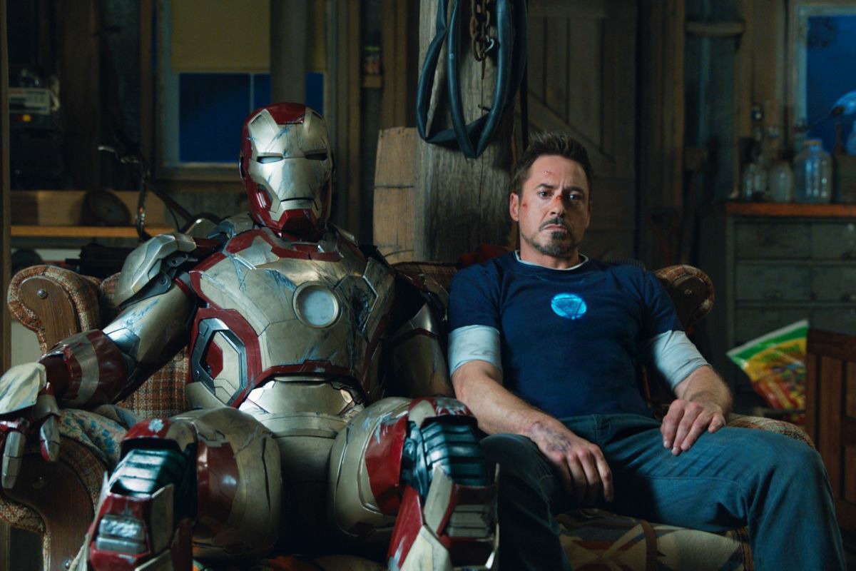 Iron Man 3 Tony Stark sitting next to Mark 42 suit Blank Meme Template
