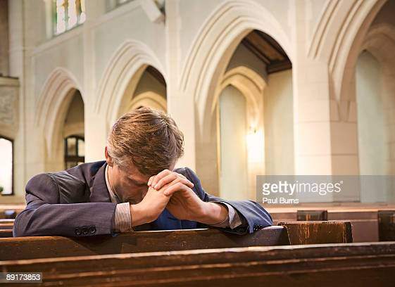 Man praying in church Blank Meme Template