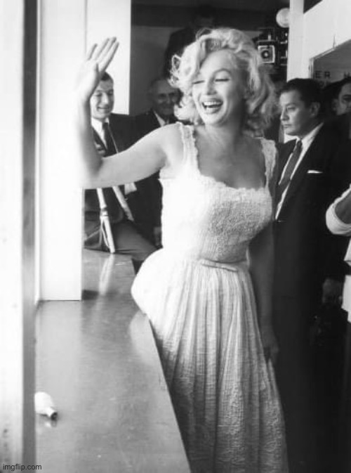 Marilyn Monroe | image tagged in marilyn monroe waving,marilyn monroe,wave,pretty woman,black and white,legend | made w/ Imgflip meme maker