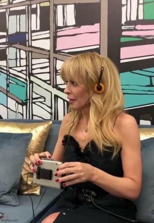 Kylie headphones | image tagged in kylie headphones | made w/ Imgflip meme maker