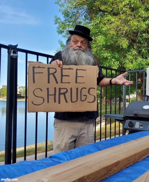 Free Shrugs | image tagged in free shrugs,shrug,new template,custom template,funny signs,guy holding cardboard sign | made w/ Imgflip meme maker
