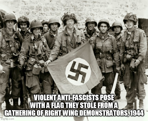 Utah Beach, St. Marcouf, France. 8 June 1944 | VIOLENT ANTI-FASCISTS POSE WITH A FLAG THEY STOLE FROM A GATHERING OF RIGHT WING DEMONSTRATORS, 1944 | image tagged in antifa,nazi,ww2 | made w/ Imgflip meme maker