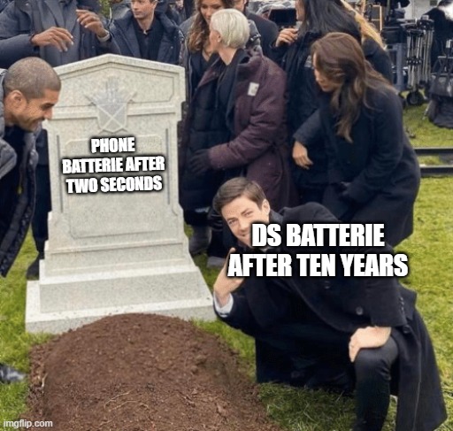 Grant Gustin over grave | PHONE BATTERIE AFTER TWO SECONDS; DS BATTERIE AFTER TEN YEARS | image tagged in grant gustin over grave | made w/ Imgflip meme maker