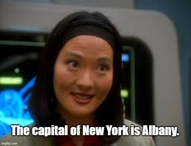 Keiko O'Brien Smiling | The capital of New York is Albany. | image tagged in keiko o'brien smiling | made w/ Imgflip meme maker
