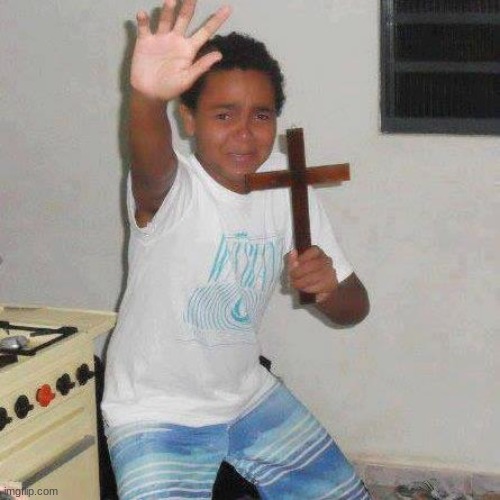 Scared kid with Cross | image tagged in scared kid with cross | made w/ Imgflip meme maker