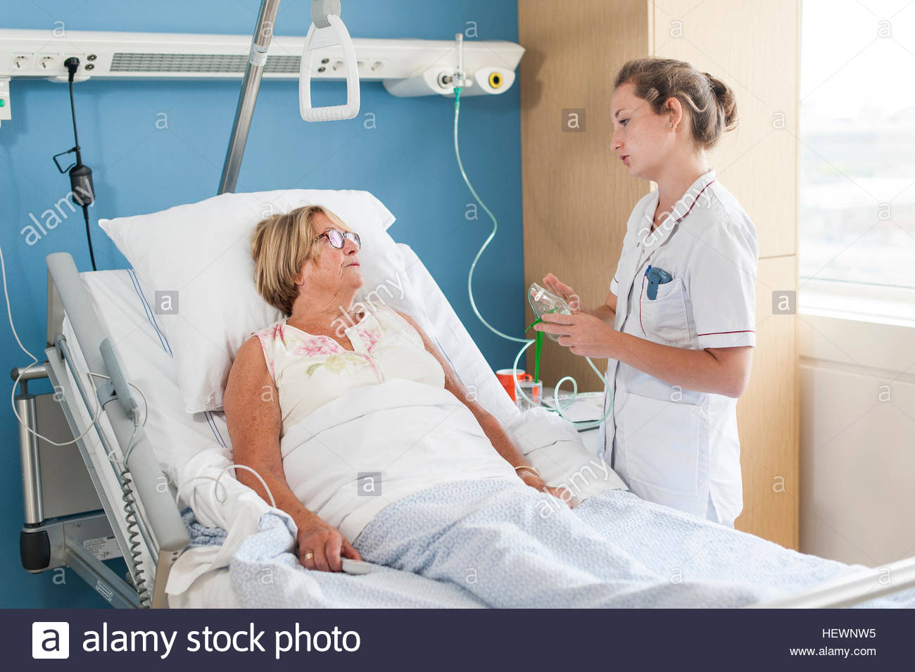 Patient in bed with nurse Blank Meme Template