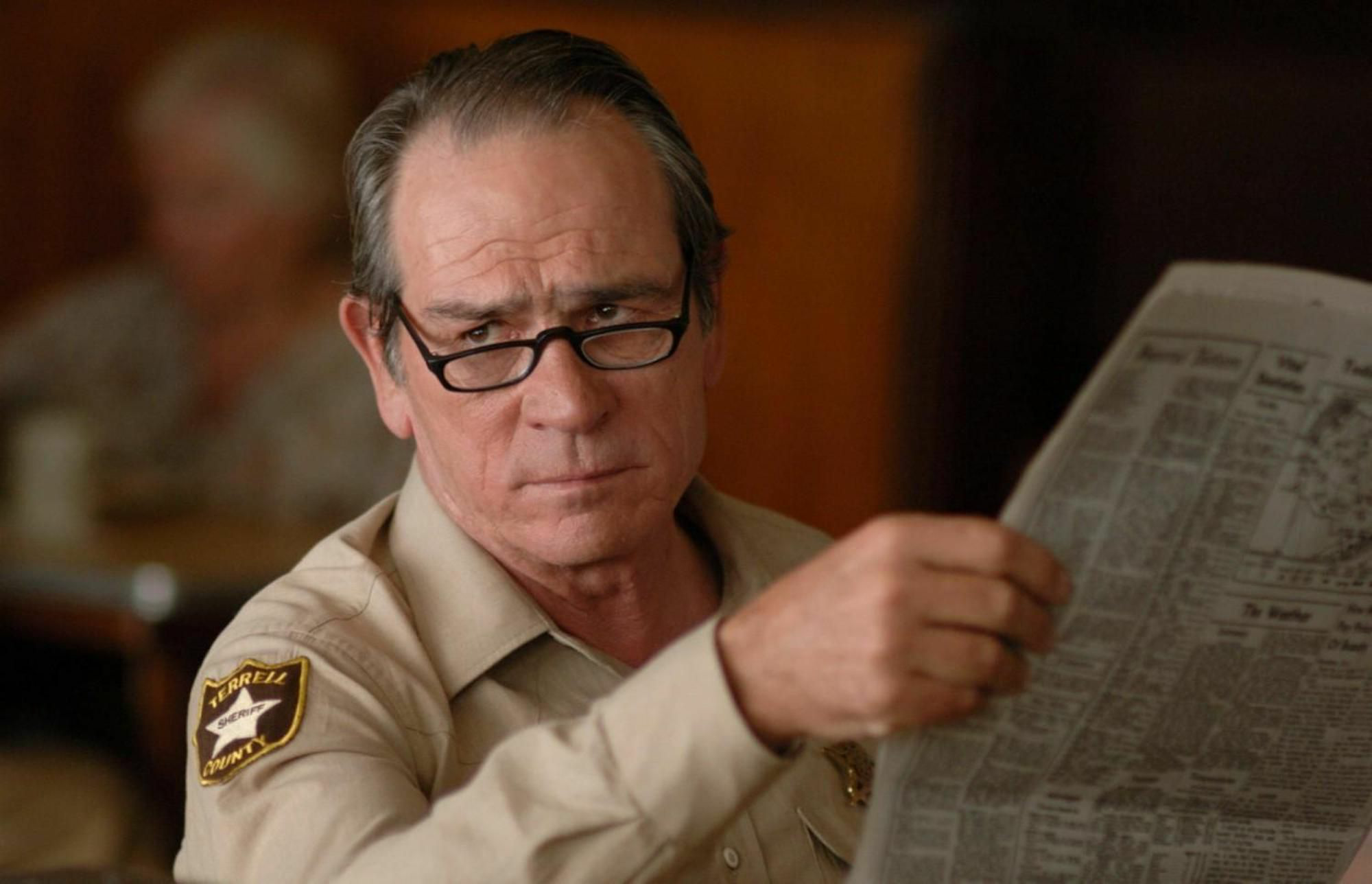 High Quality Tommy Lee Jones with newspaper Blank Meme Template