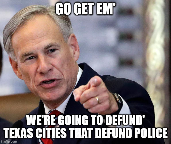 Gov. Greg Abbott signing a law that would prohibit cities within Texas