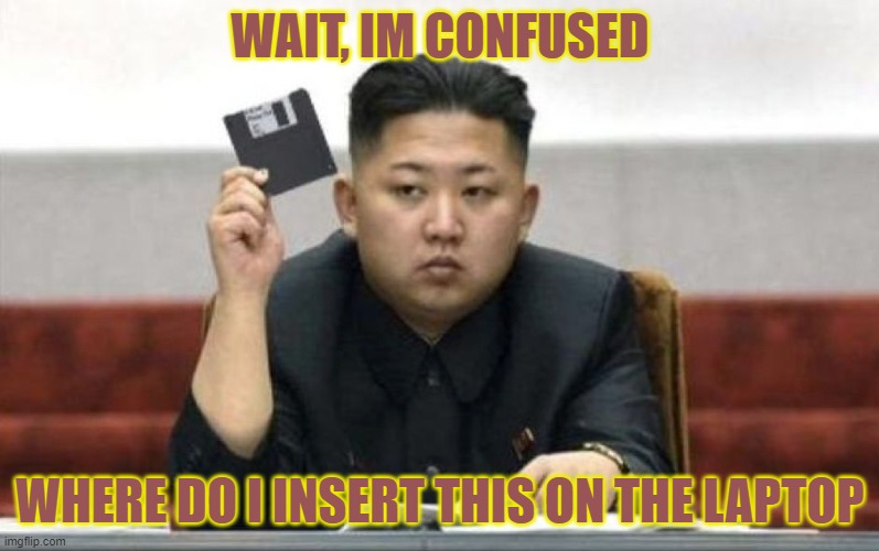 North Korea Technology | WAIT, IM CONFUSED; WHERE DO I INSERT THIS ON THE LAPTOP | image tagged in north korea technology | made w/ Imgflip meme maker